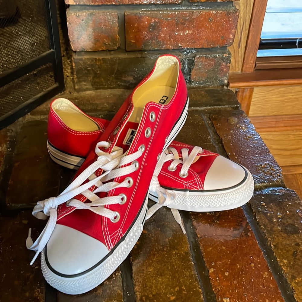 Brand new men’s size 9 red chucks - no box but never worn.